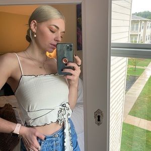 White crop top, black trim. size small